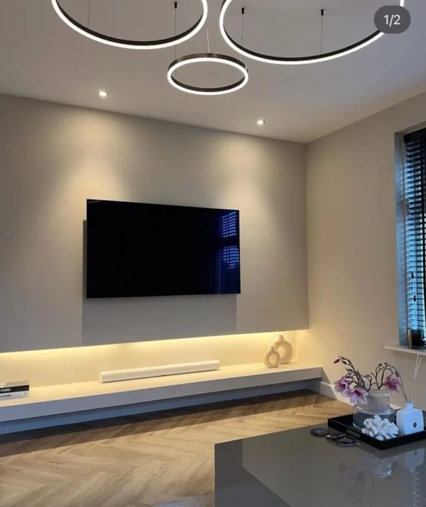 Cinewall Nikau – modern TV wall with fireplace and natural textured finish